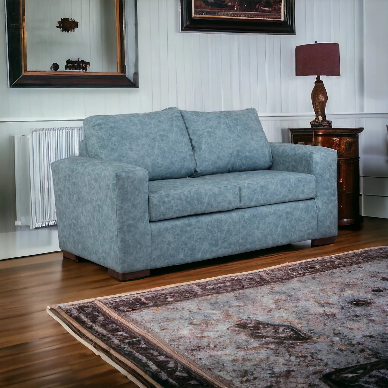 Comodidad y estilo en sofá de cuero sintético | mueblesamerica.cl