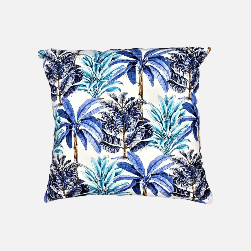 Cojín azul con palmeras en lona | mueblesamerica.cl
