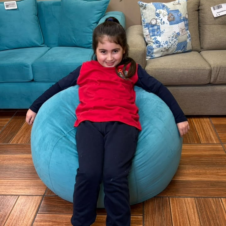 Pouf Pera Felpa Turquesa - imagen de cliente 1