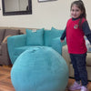 Video del Pouf Pera Felpa Turquesa